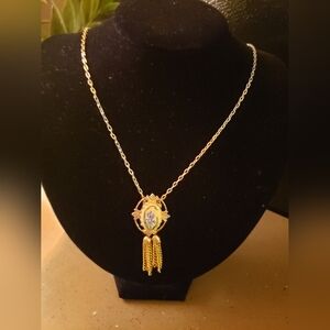 Vintage gold necklace with gold pendant & purple iris center